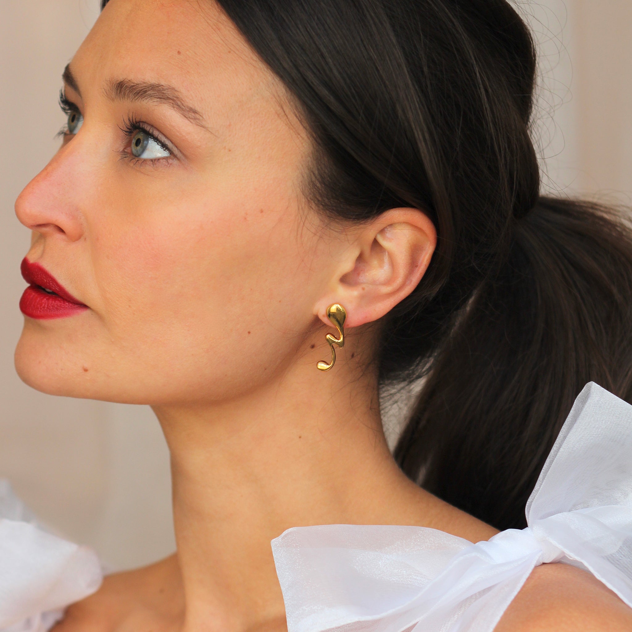 Cast Silver Uncanny Ear Studs with Gold Vermeil